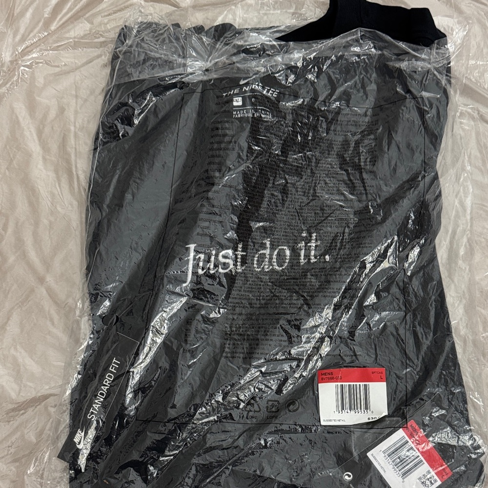Long sleeve Nike Black Tee with White Slogan